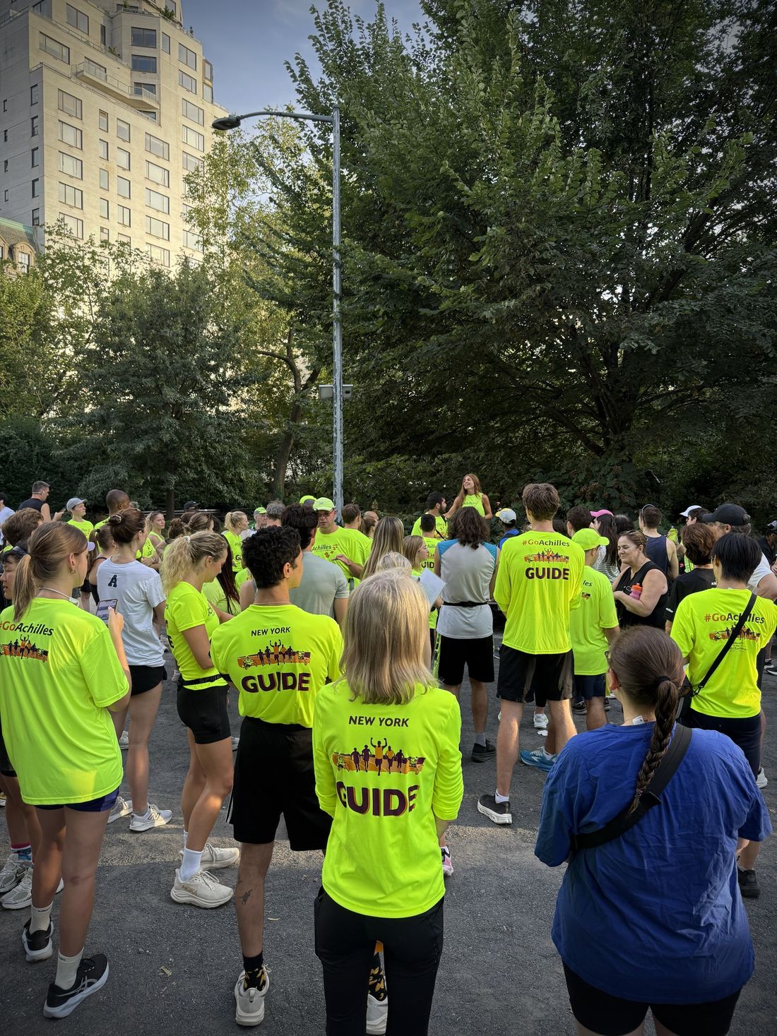 Achilles International guides gathering in Central Park before an evening run
