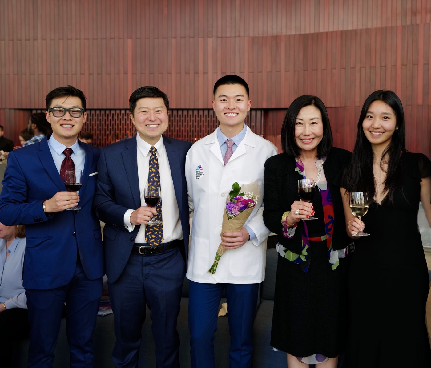 Alexander Yu with his family at his white coat ceremony