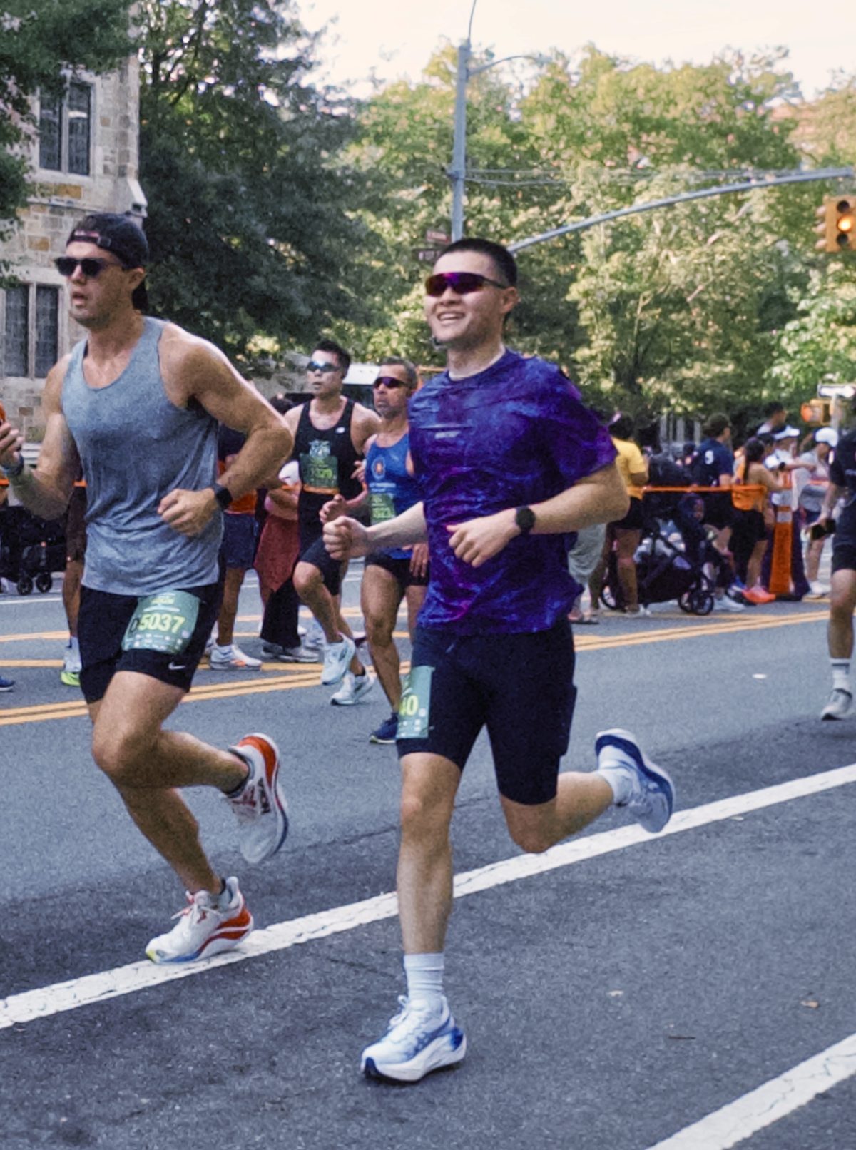 Alexander Yu running a road race in New York City
