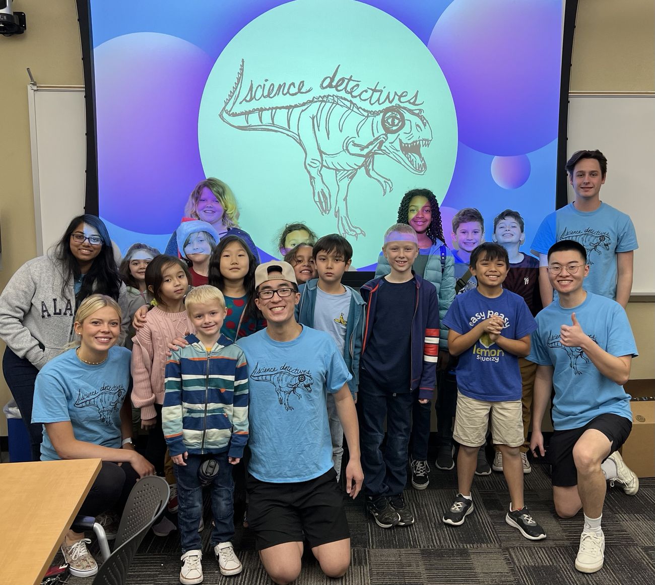 Alexander Yu with elementary students at a Science Detectives session
